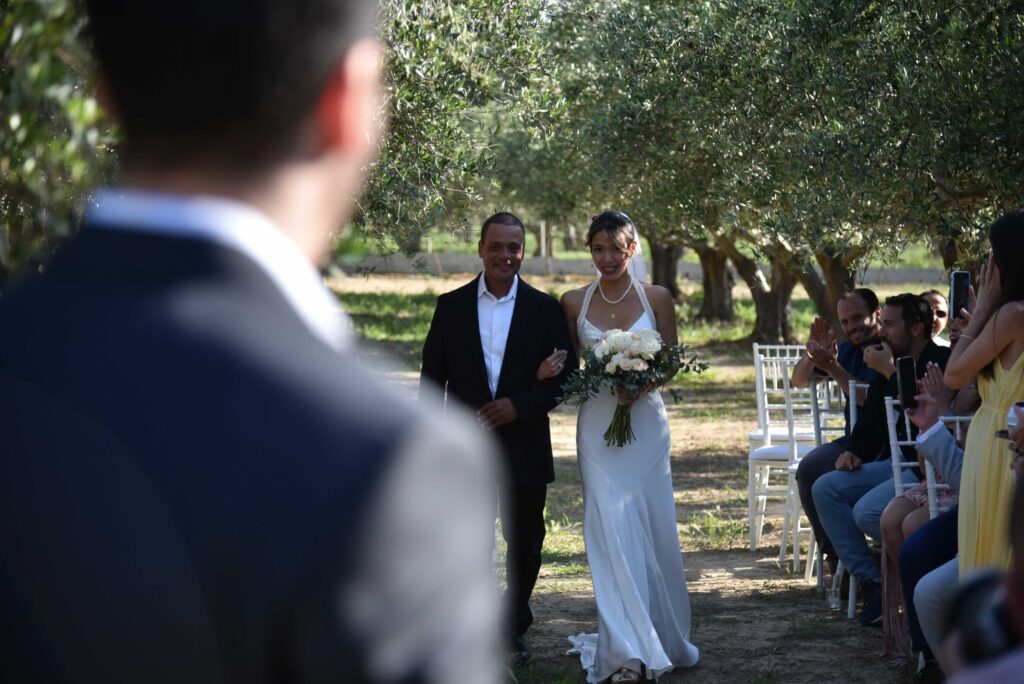 Lili & Gabriel walking down the isle | Esthesis Events