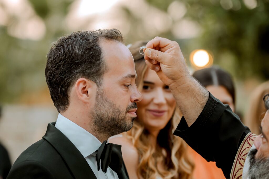 The priest, Theodore and Marie during the wedding ceremony | Esthesis Events