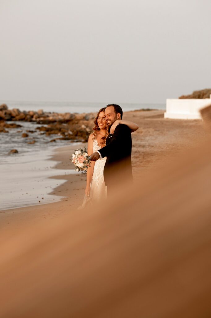 Marie and Theodore posing on the beach | Esthesis Events