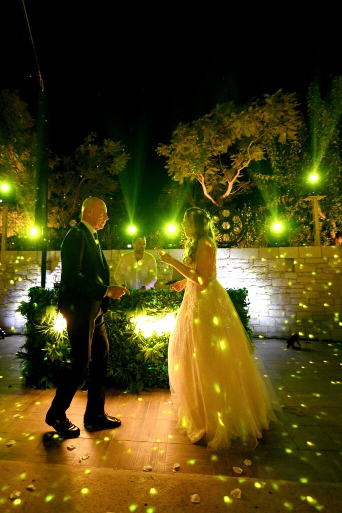 Marie dancing with her father at the wedding party| Esthesis Events