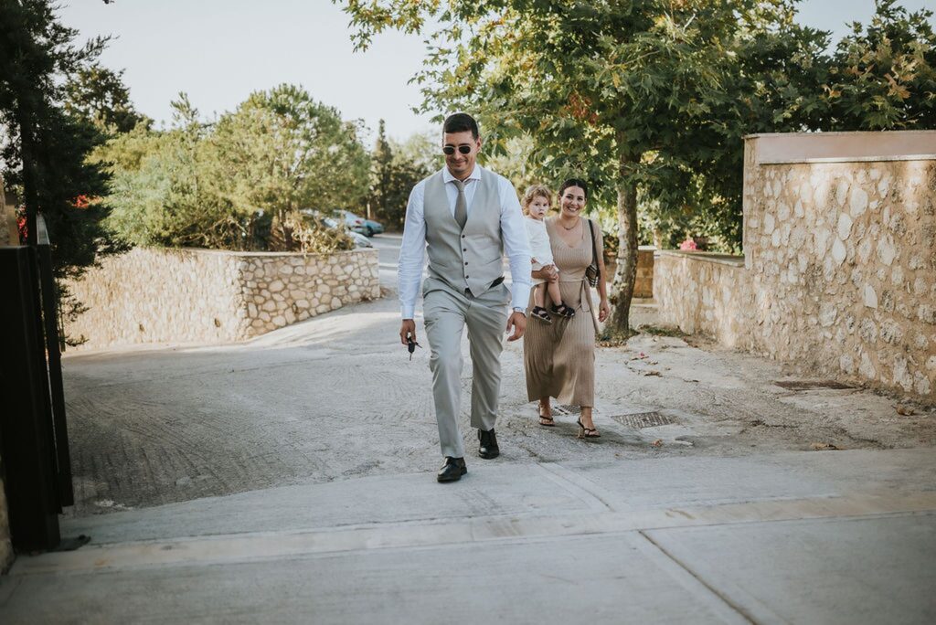 Yannis arriving with his parents for the baptism | Esthesis Events Yannis arriving with his parents for the baptism | Esthesis Events