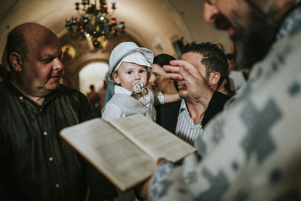 Yannis during the final part of the christening ceremony | Esthesis Events Yannis during the final part of the christening ceremony | Esthesis Events
