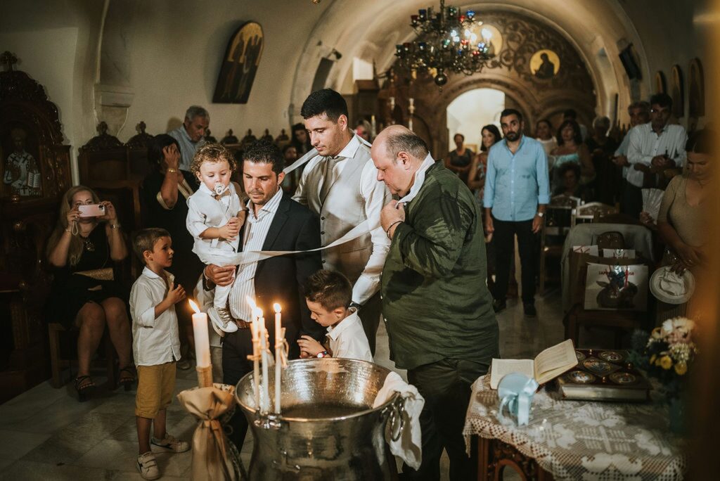 Yannis during the final part of the christening ceremony | Esthesis Events Yannis during the final part of the christening ceremony | Esthesis Events