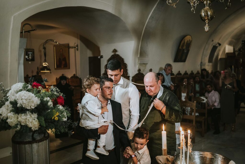 Yannis during the final part of the christening ceremony | Esthesis Events Yannis during the final part of the christening ceremony | Esthesis Events