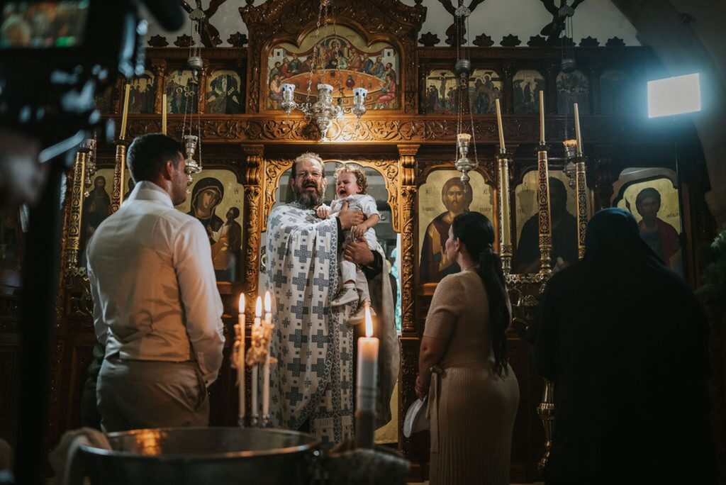 Yannis during the final part of the christening ceremony | Esthesis Events Yannis during the final part of the christening ceremony | Esthesis Events