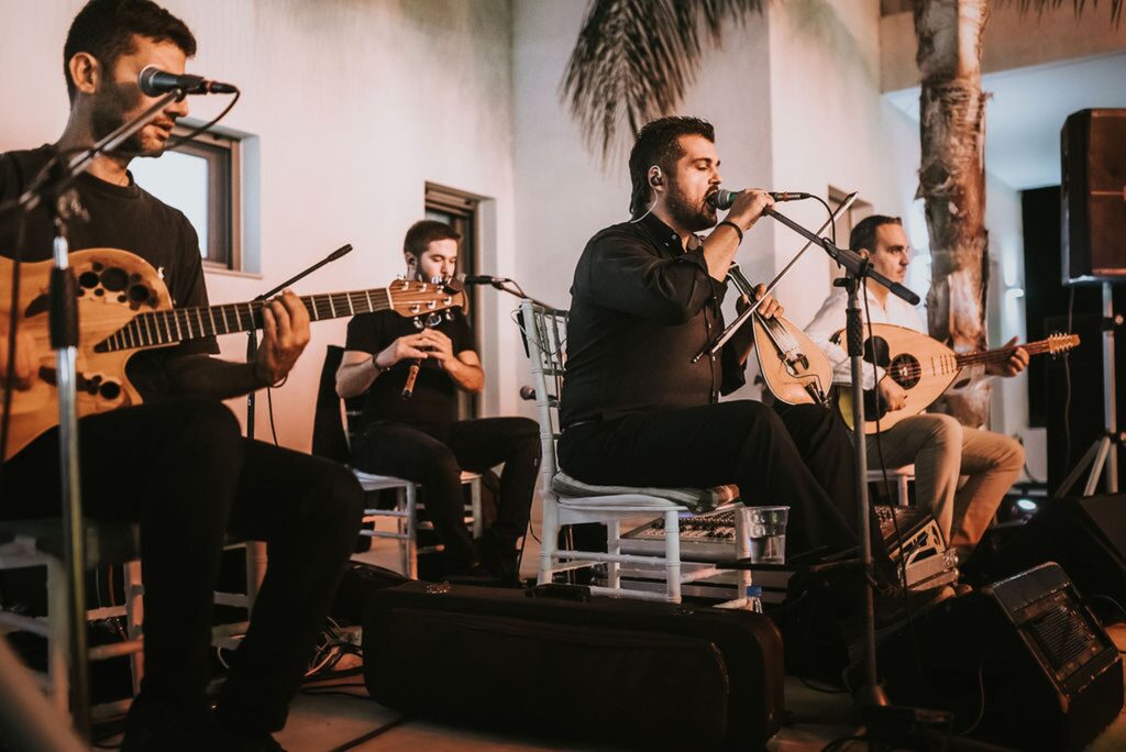 Live band performing during Yannis' baptism reception | Esthesis Events Live band performing during Yannis' baptism reception | Esthesis Events
