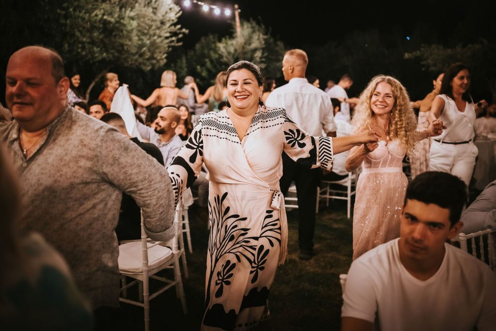 Guests & family dancing during Yannis' christening reception | Esthesis Events Guests & family dancing during Yannis' christening reception | Esthesis Events