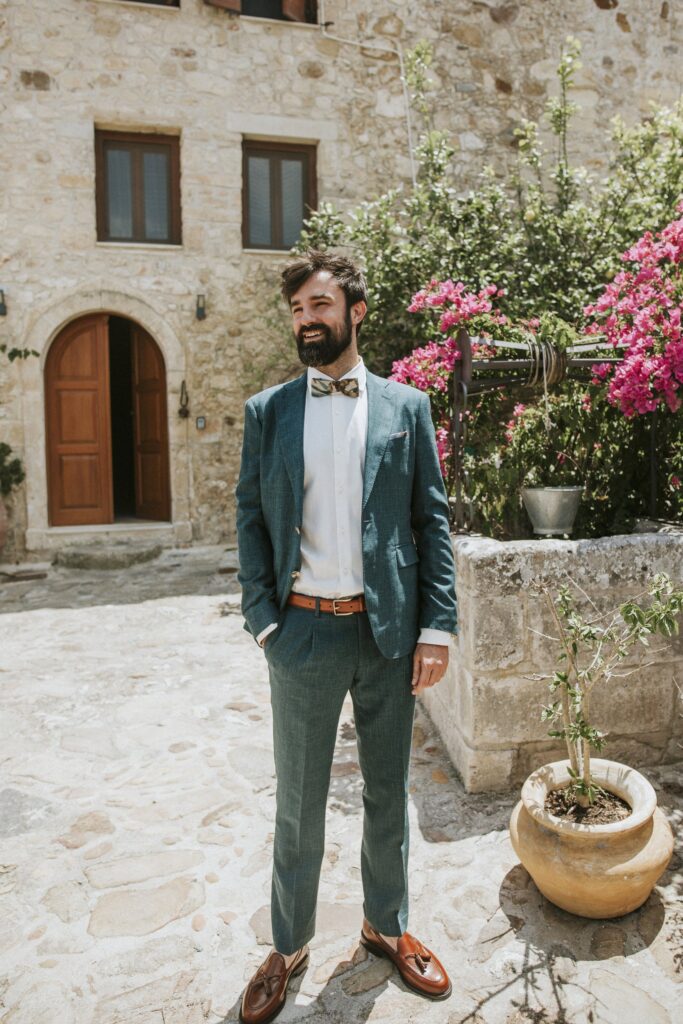 Michael smiling in his groom's attire at Agreco Farm. | Esthesis Events Michael smiling in his groom's attire at Agreco Farm. | Esthesis Events