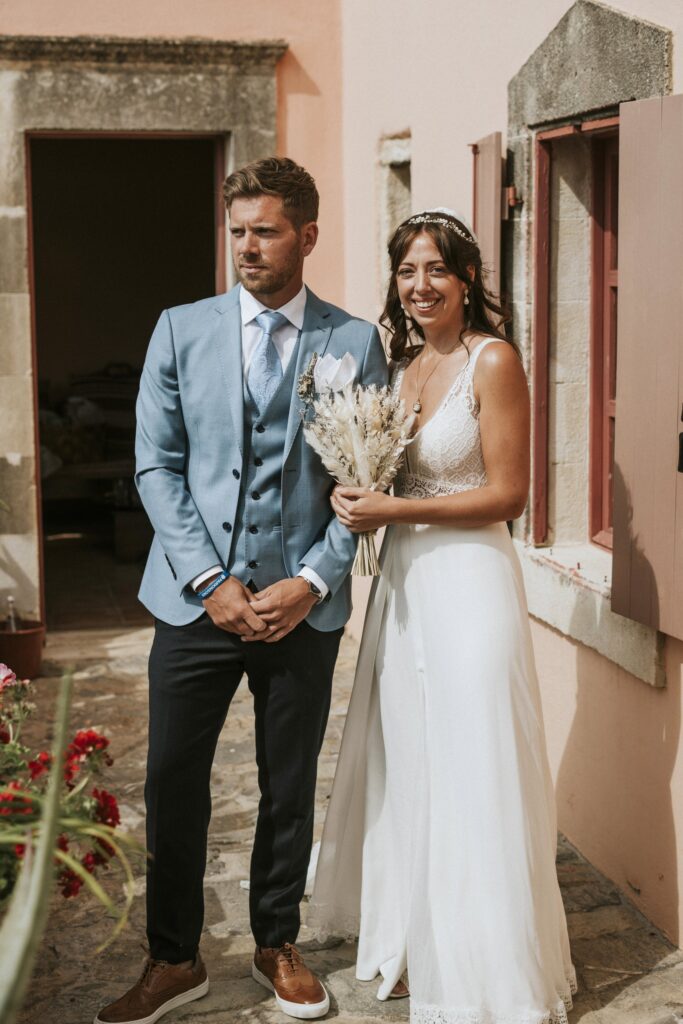 A portrait of Jodie in her wedding dress, posing with a loved one. | Esthesis Events A portrait of Jodie in her wedding dress, posing with a loved one. | Esthesis Events