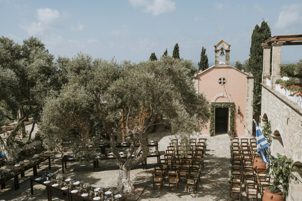 A panoramic shot of the traditional wedding banquet setup near the church at Agreco Farm. | Esthesis Events A panoramic shot of the traditional wedding banquet setup near the church at Agreco Farm. | Esthesis Events