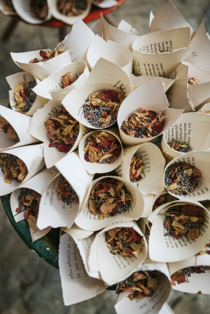 A detail shot of the traditional rice and botanical mixture prepared for the wedding toss during the ceremony exit. | Esthesis Events A detail shot of the traditional rice and botanical mixture prepared for the wedding toss during the ceremony exit. | Esthesis Events