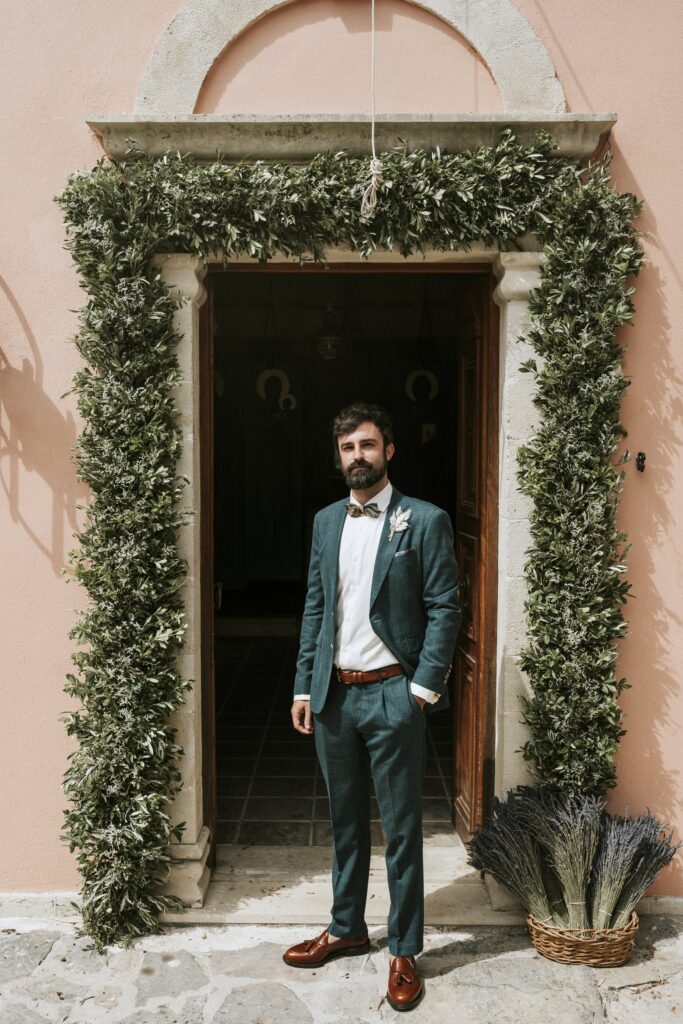 A portrait of Michael posing at the entrance of the church. | Esthesis Events A portrait of Michael posing at the entrance of the church. | Esthesis Events