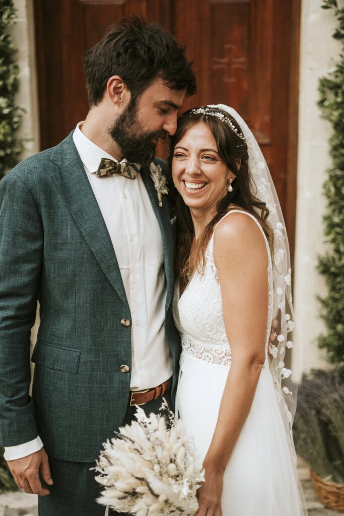 A candid moment of Michael gazing adoringly at his bride, Jodie, as she smiles. | Esthesis Events A candid moment of Michael gazing adoringly at his bride, Jodie, as she smiles. | Esthesis Events
