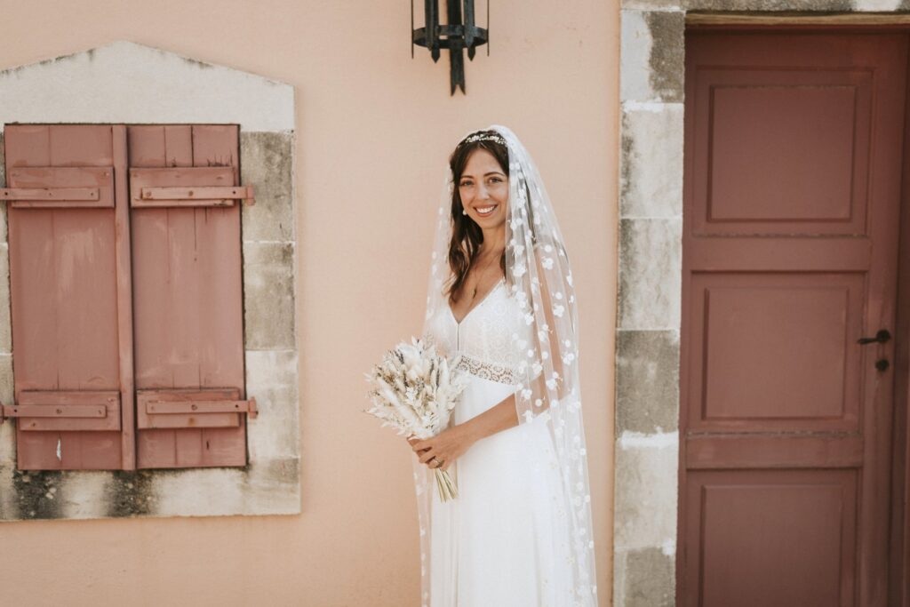 A beautiful portrait of the bride, Jodie, standing gracefully with her wedding bouquet. | Esthesis Events A beautiful portrait of the bride, Jodie, standing gracefully with her wedding bouquet. | Esthesis Events