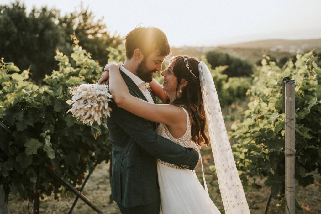 A beautiful portrait of Michael and Jodie sharing a warm smile and locking eyes while embraced. | Esthesis Events A beautiful portrait of Michael and Jodie sharing a warm smile and locking eyes while embraced. | Esthesis Events