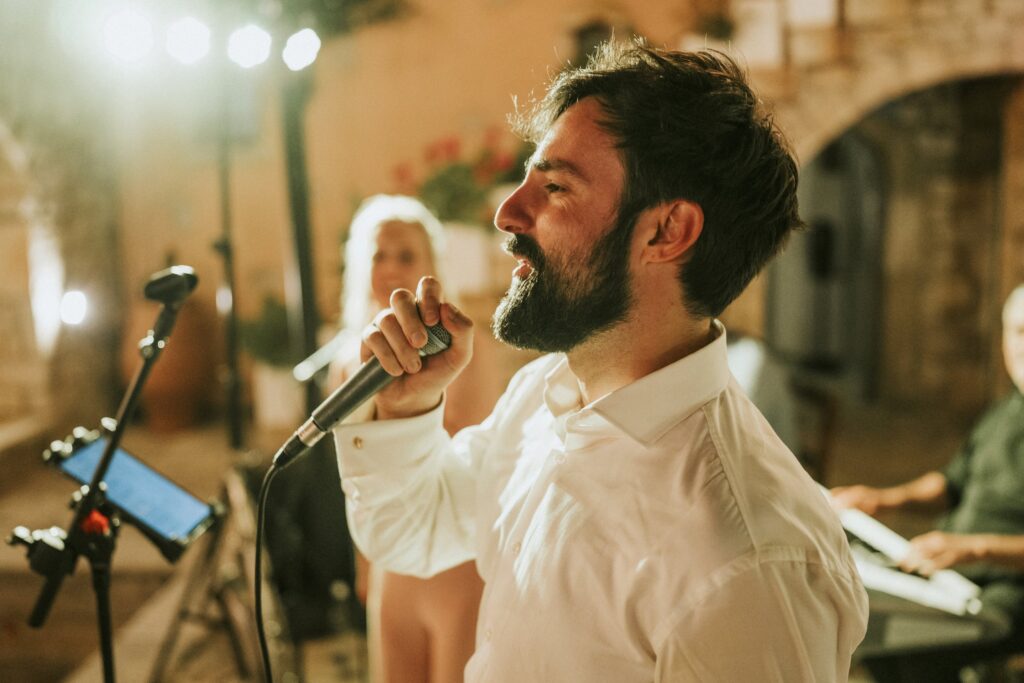 Michael singing karaoke at his wedding reception. | Esthesis Events Michael singing karaoke at his wedding reception. | Esthesis Events