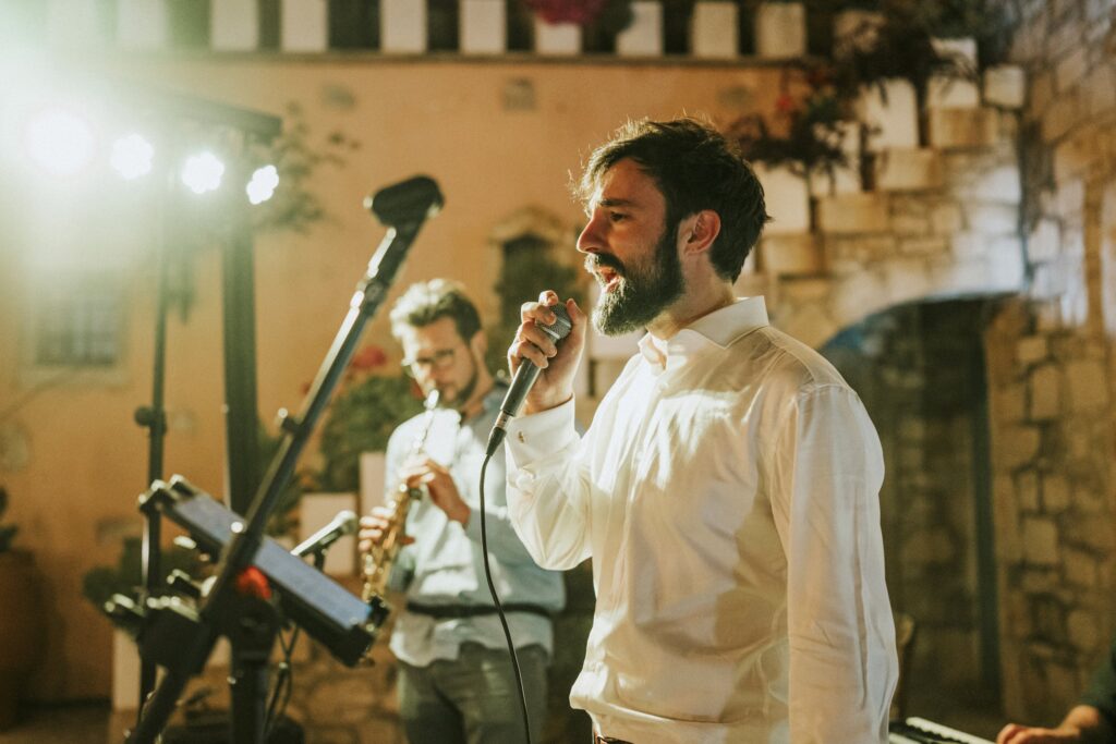 Michael singing karaoke at his wedding reception. | Esthesis Events Michael singing karaoke at his wedding reception. | Esthesis Events